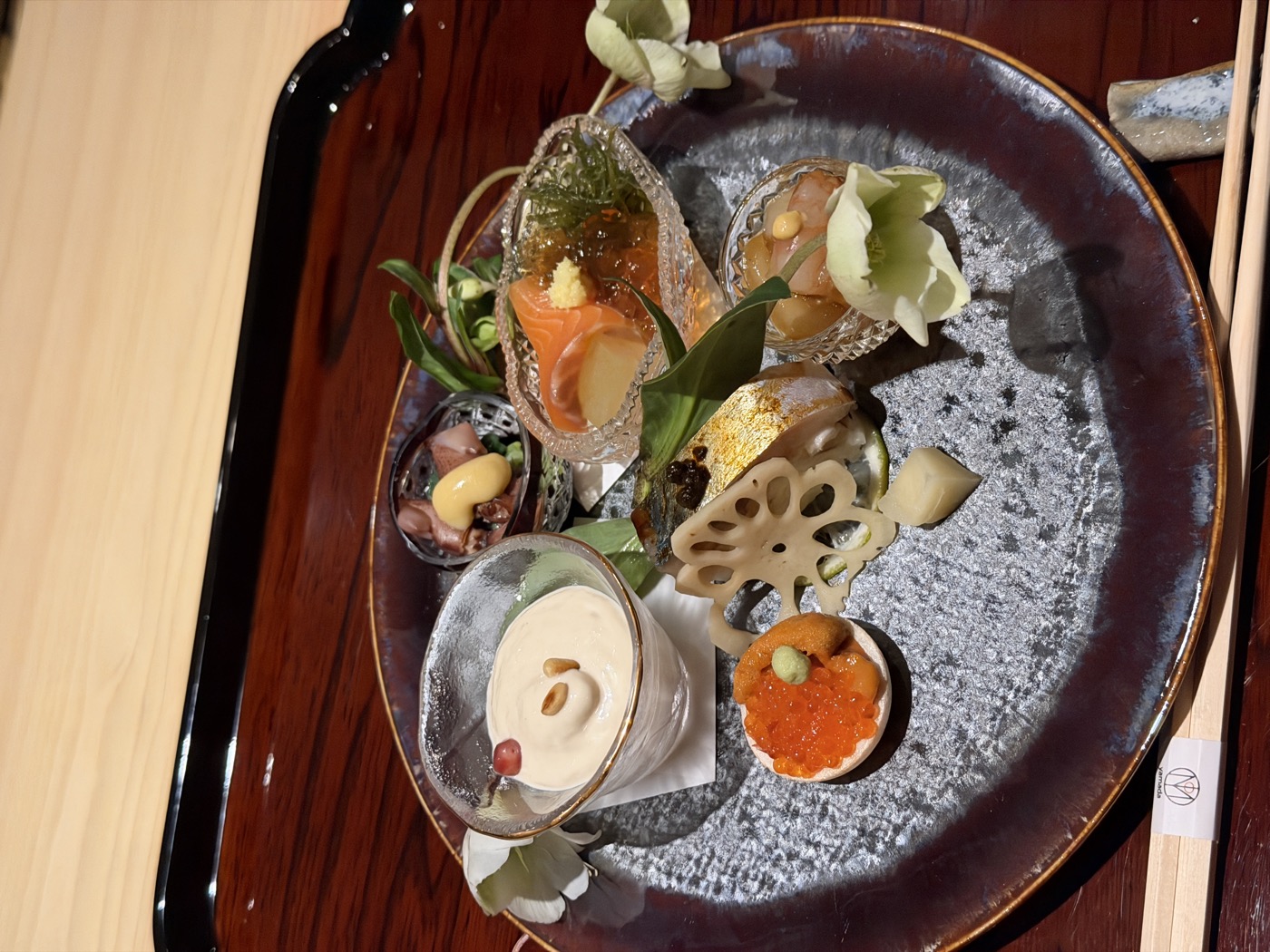 A seasonal plate of small bites at a kaiseki counter in New York