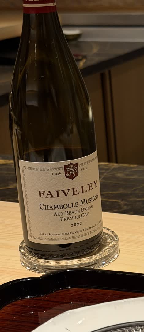 A bottle of Faiveley Chambolle-Musigny Premier Cru red Burgundy